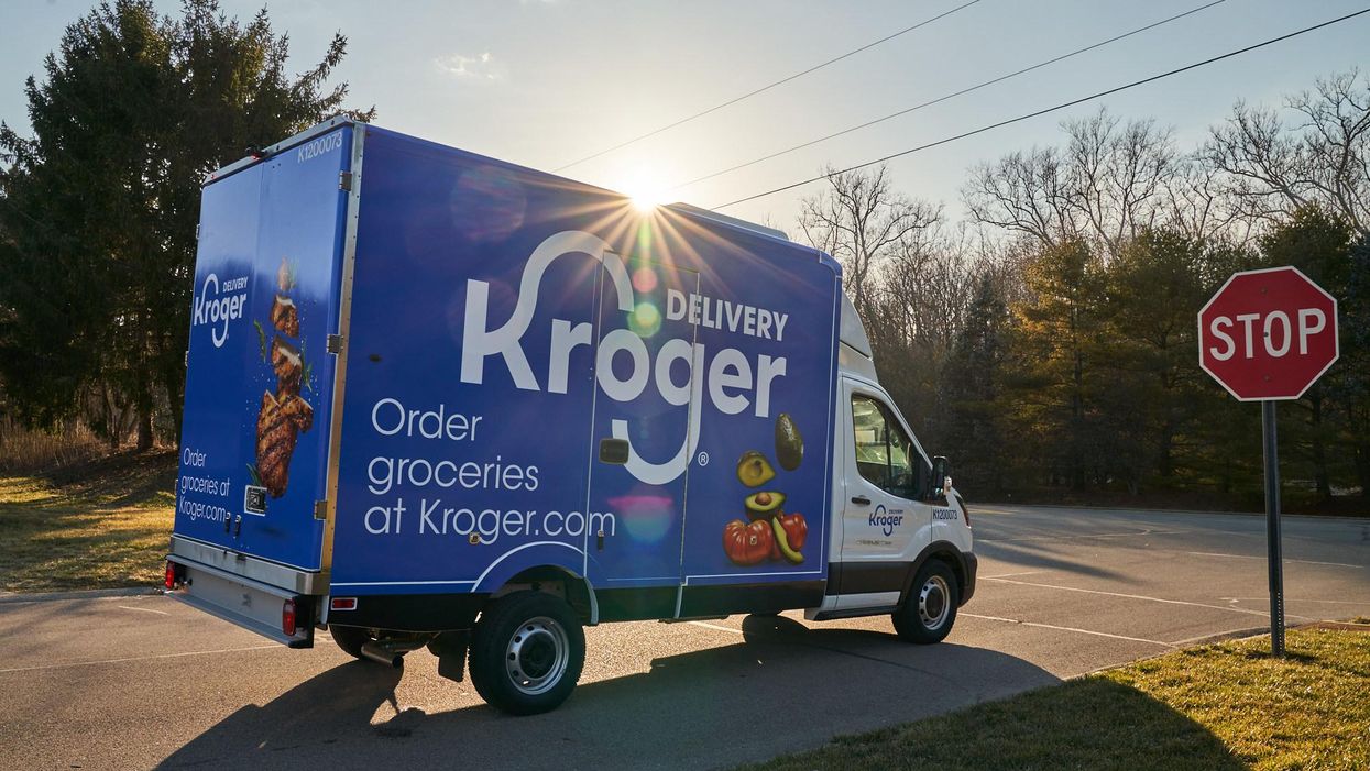 A Kroger truck on a road