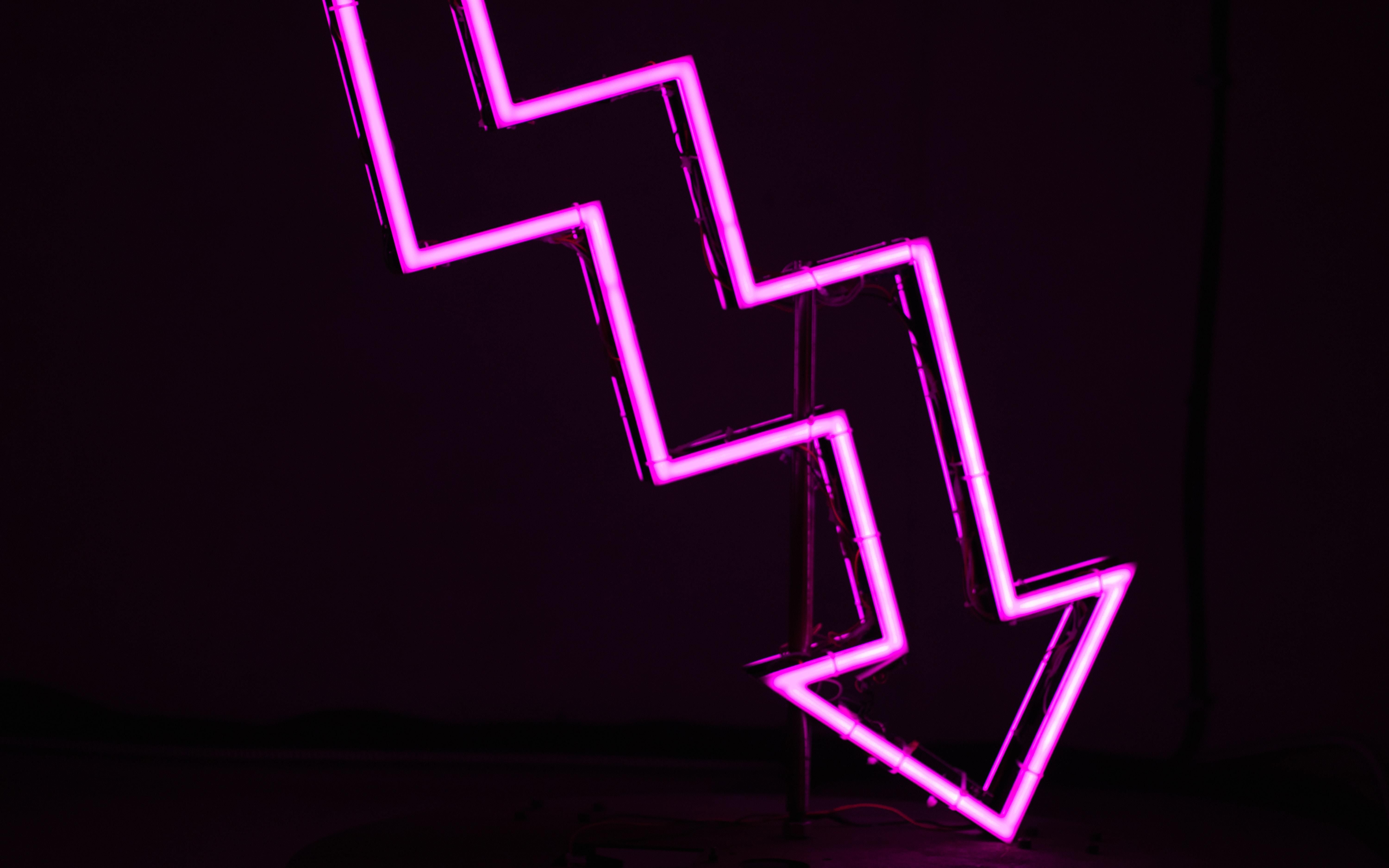 a pink arrow pointing down