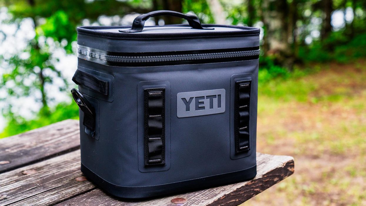 a Yeti soft cooler on a picnic table