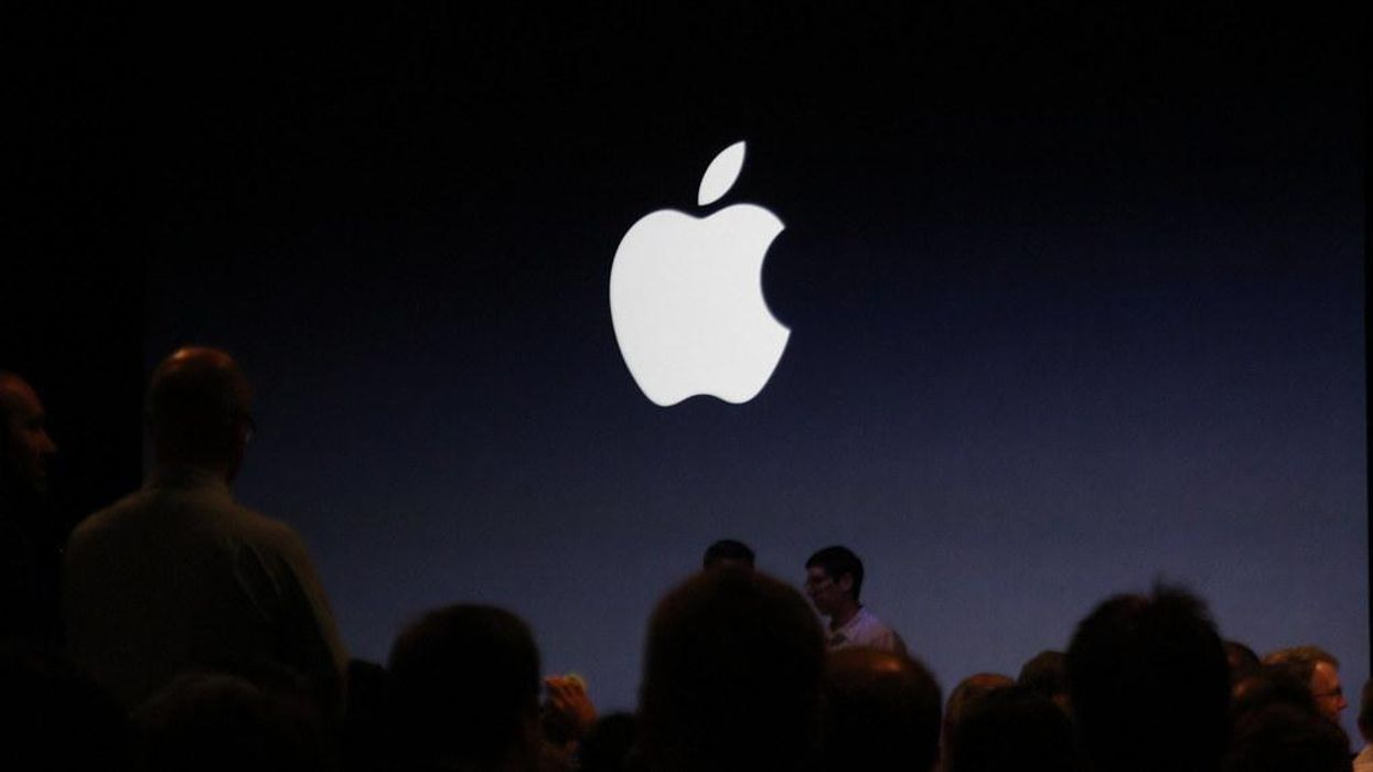 an apple logo on a stage