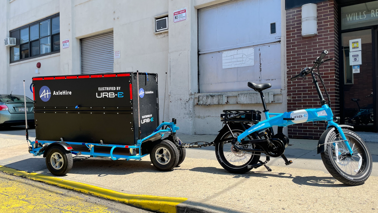 an urb-e bike and container