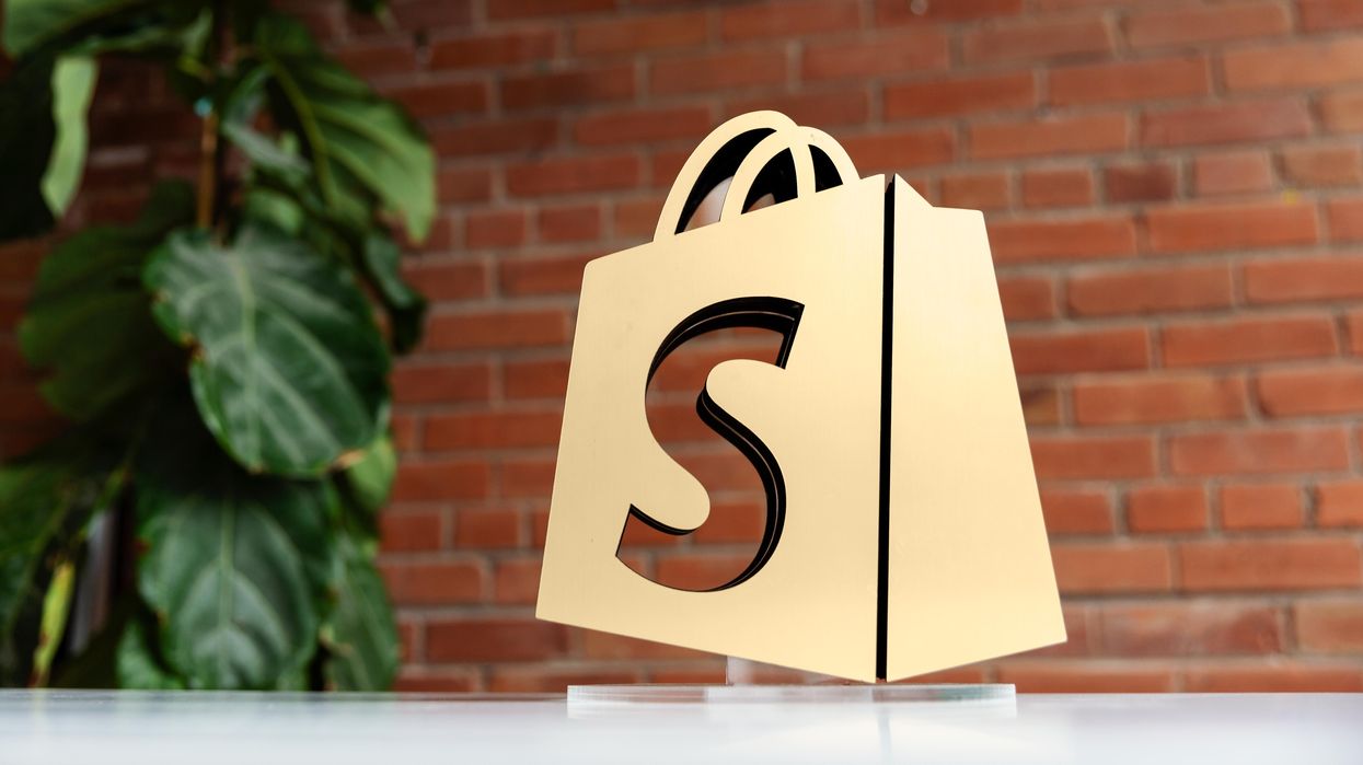 Shopify logo on a table
