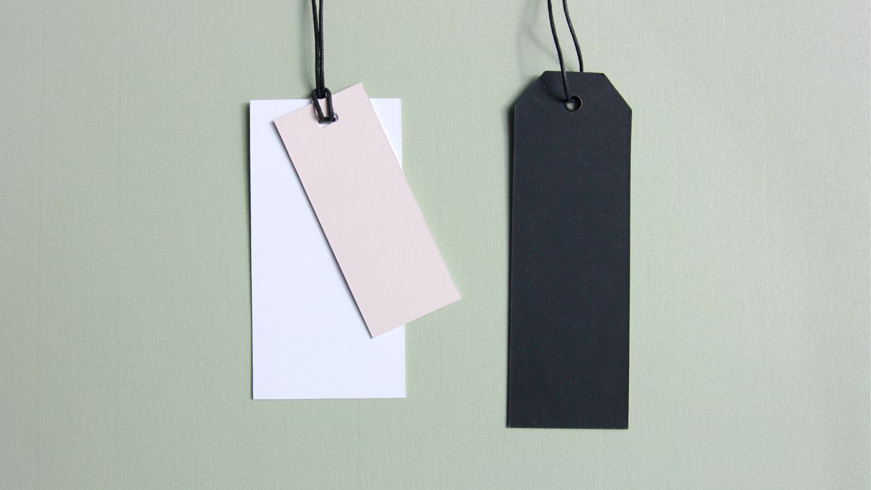 three assorted-color tags