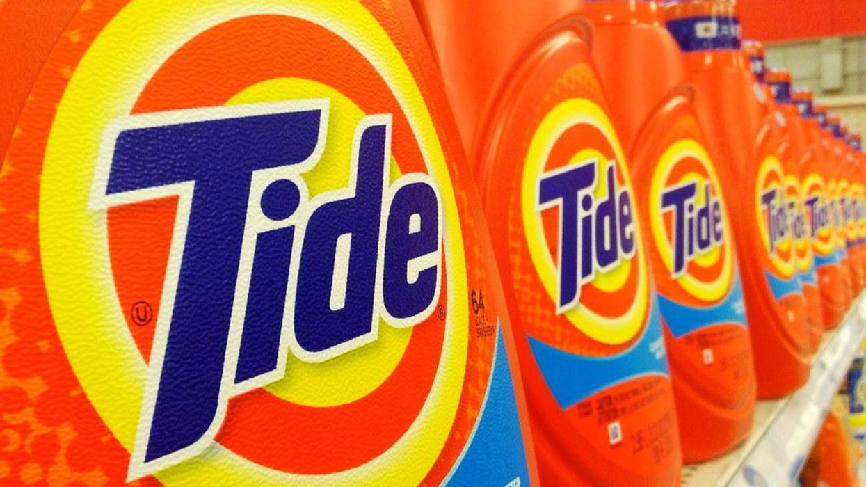 Procter & Gamble holds share, shifts marketing as prices rise